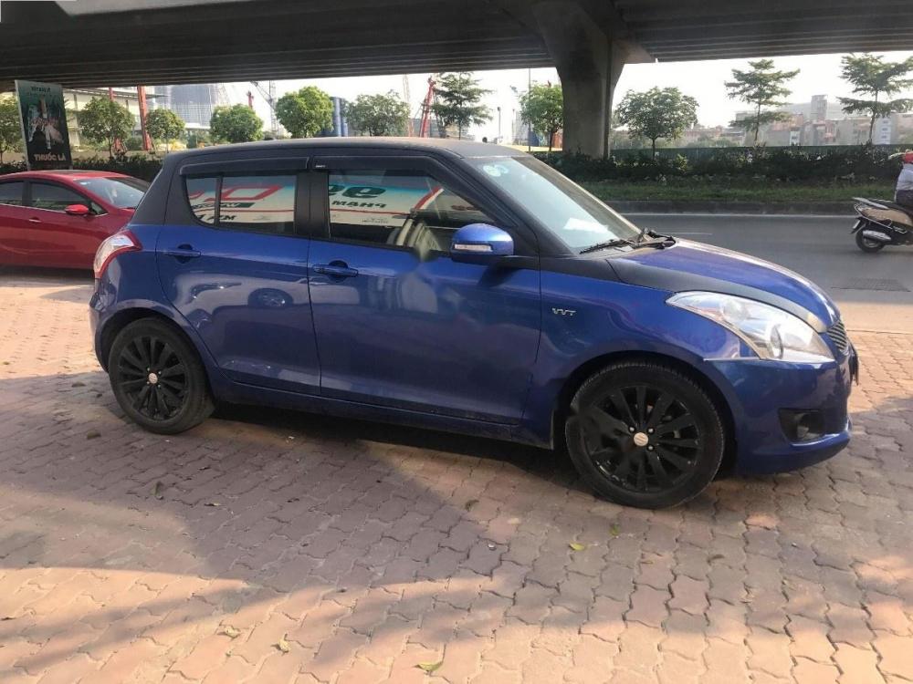 Suzuki Swift 1.4 AT 2016 - Bán xe Suzuki Swift 1.4 AT đời 2016, màu xanh lam chính chủ