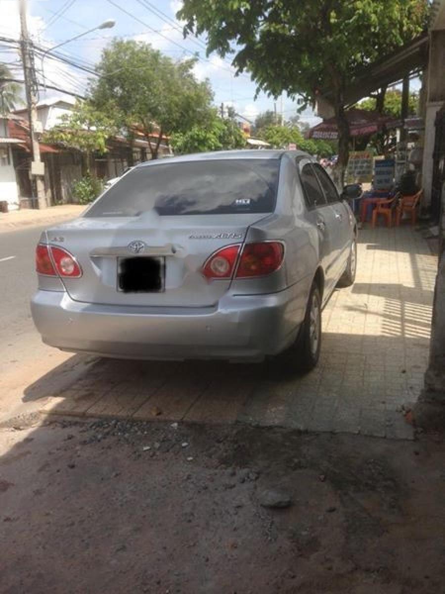 Toyota Corolla altis 1.8G MT 2001 - Bán Toyota Corolla Altis 1.8G MT sản xuất năm 2001, màu bạc giá cạnh tranh