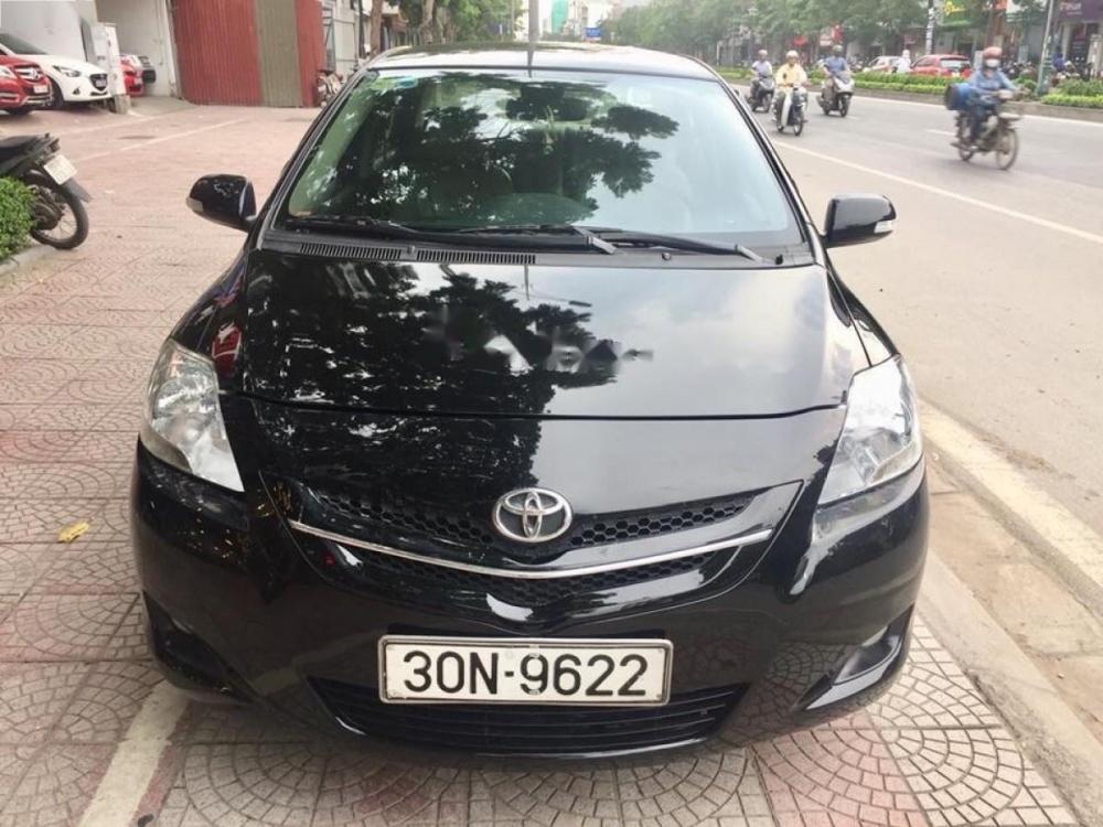 Toyota Vios 1.5E 2009 - Cần bán xe Toyota Vios 1.5 E đời 2009, màu đen