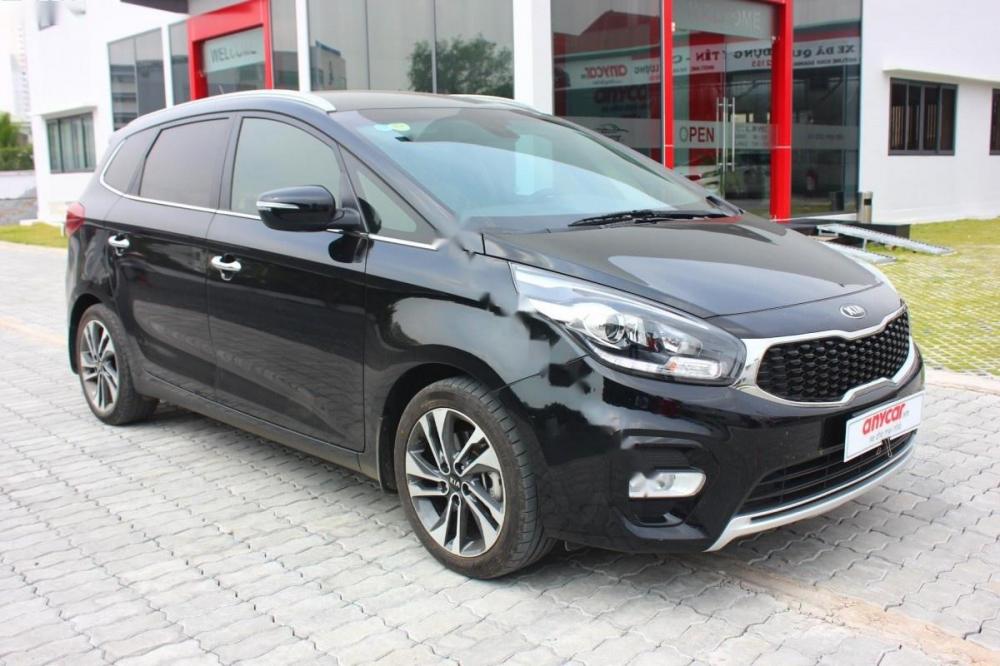 Kia Rondo GAT 2018 - Cần bán lại xe Kia Rondo GAT sản xuất 2018, màu đen