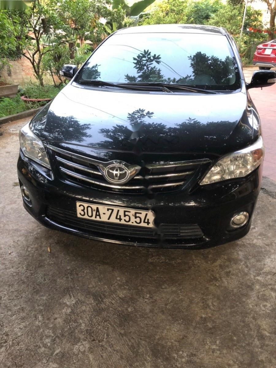 Toyota Corolla altis 2011 - Cần bán gấp Toyota Corolla Altis đời 2011, màu đen còn mới