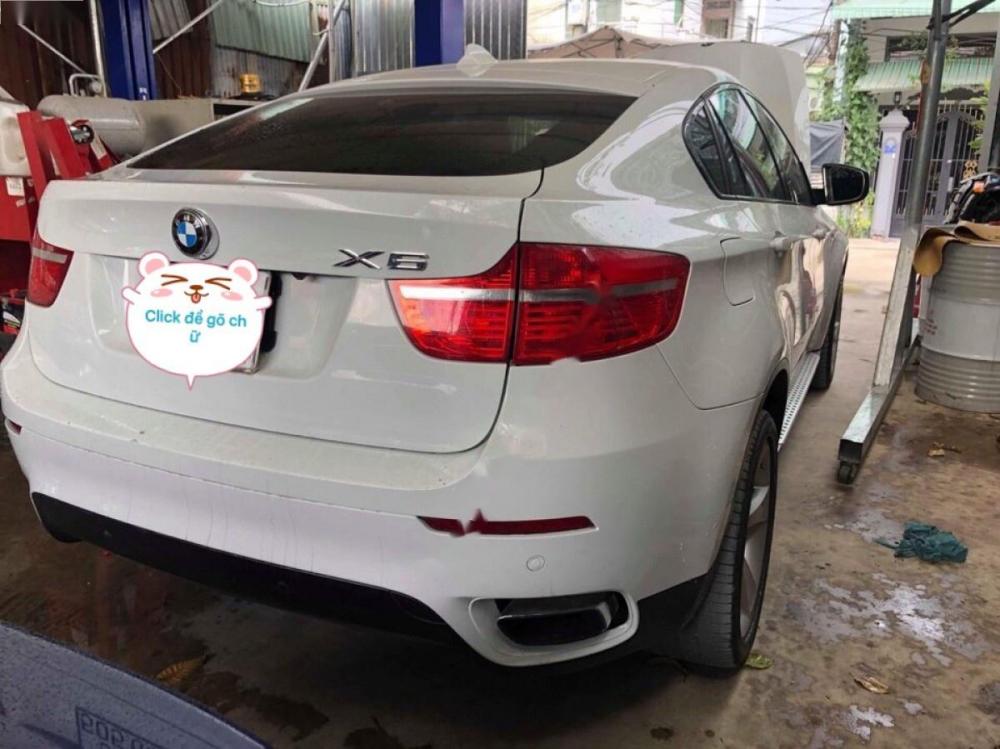 BMW X6 xDriver50i 2009 - Cần bán gấp BMW X6 xDriver50i năm 2009, màu trắng, nhập khẩu