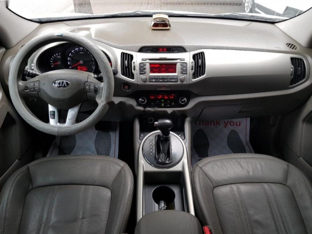 Kia Sportage 2.0 AT 2013 - Cần bán Kia Sportage 2.0 AT đời 2013, màu trắng, nhập khẩu, 650 triệu