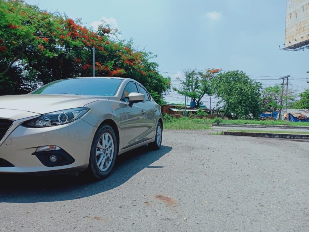 Mazda 3 1.5G 2016 - Bán ô tô Mazda 3 sản xuất 2016 AT, màu vàng cát, giá chỉ 615 triệu