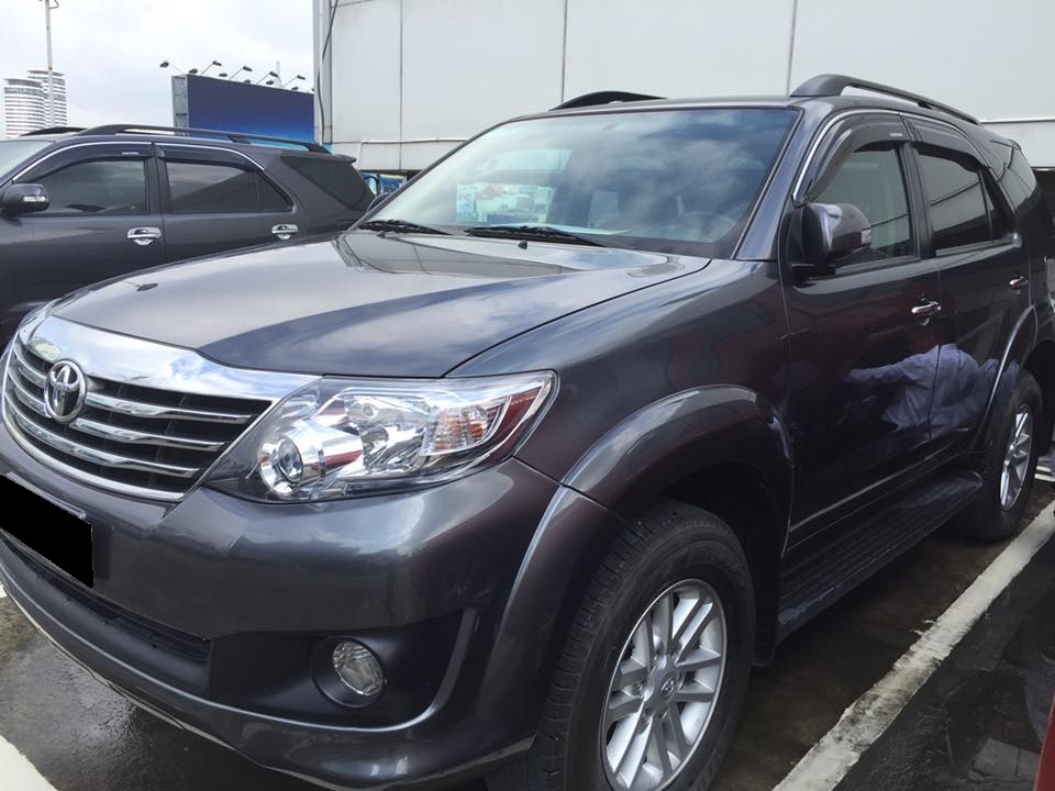 Toyota Fortuner 2014 - Gia đình cần bán Fortuner 2014, số tự động máy xăng, màu xám lông chuột