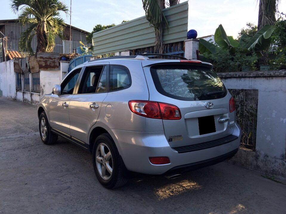 Hyundai Santa Fe 2009 - Cần bán Hyundai Santa Fe đời 2009, màu bạc số sàn, 465 triệu