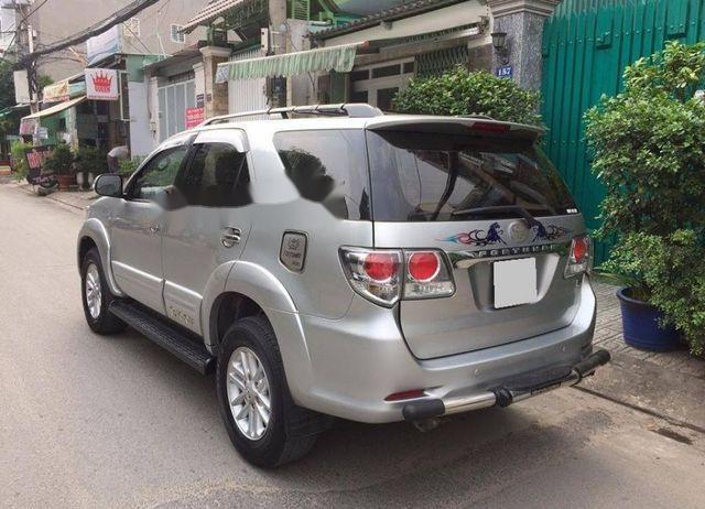 Toyota Fortuner G  2013 - Bán Toyota Fortuner G sản xuất 2013, màu bạc xe gia đình