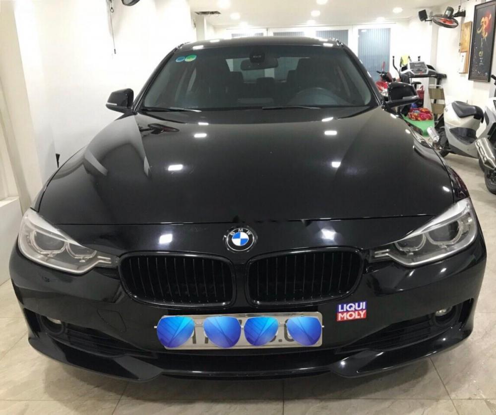 BMW 3 Series 320i 2013 - Cần bán lại xe BMW 3 Series 320i năm sản xuất 2013, màu đen, nhập khẩu nguyên chiếc, giá chỉ 865 triệu