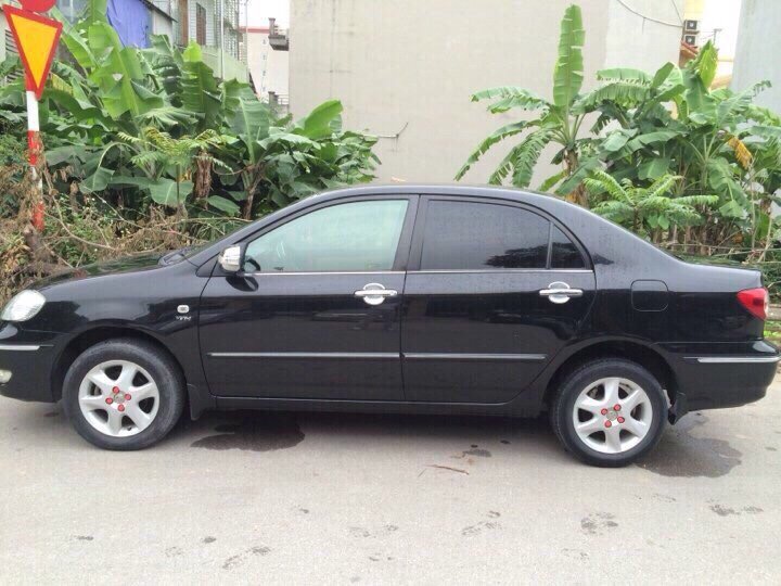 Toyota Corolla altis G 2006 - Cần bán lại xe Toyota Corolla altis G sản xuất 2006, màu đen