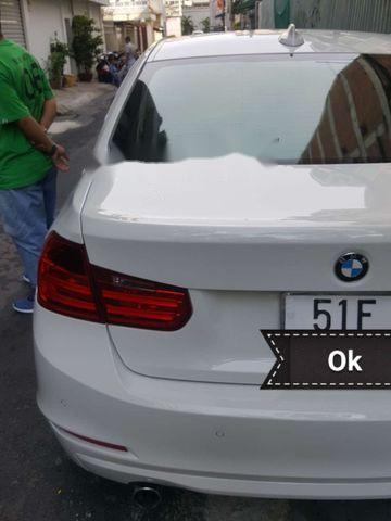 BMW 3 Series 320i 2015 - Cần bán xe BMW 3 Series 320i đời 2015, màu trắng, nhập khẩu nguyên chiếc còn mới, 970tr