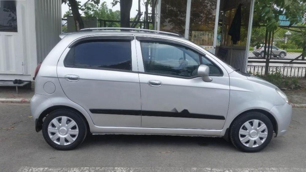 Chevrolet Spark MT   2009 - Gia đình bán lại xe Chevrolet Spark MT 2009, màu bạc 