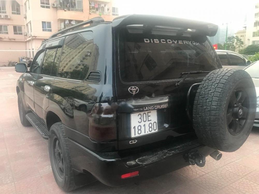 Toyota Land Cruiser GX 4.5 2002 - Bán Toyota Land Cruiser GX 4.5 2002, màu đen