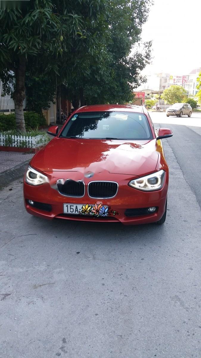 BMW 1 Series 116i  2013 - Bán BMW 1 Series 116i đời 2013, xe nhập, màu cam