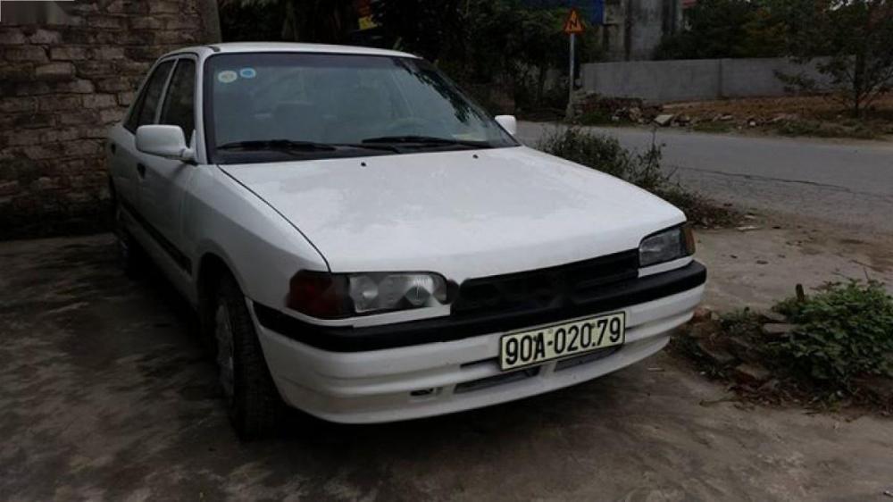 Mazda 323 1997 - Bán Mazda 323 sản xuất năm 1997, màu trắng, nhập khẩu