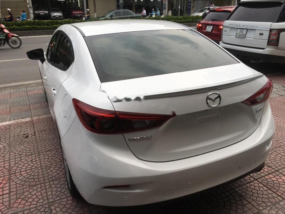 Mazda 3 2.0 AT 2016 - Cần bán Mazda 3 2.0 AT sản xuất năm 2016, màu trắng, giá 670tr