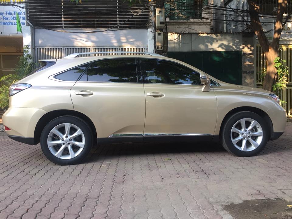 Lexus RX 350 2010 - Cần bán Lexus RX350 2010, màu vàng nội thất kem cực chất