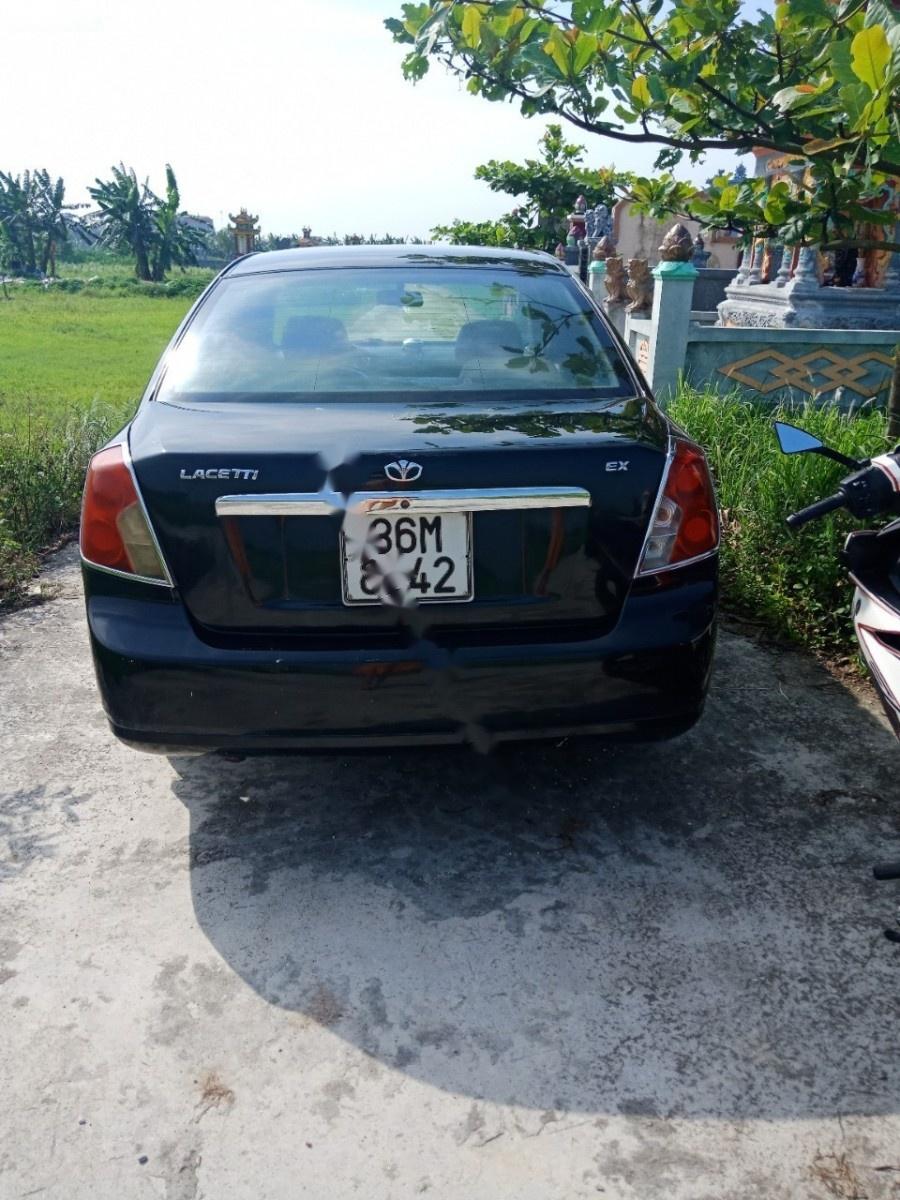 Daewoo Lacetti 2009 - Cần bán xe Daewoo Lacetti 2009, màu đen