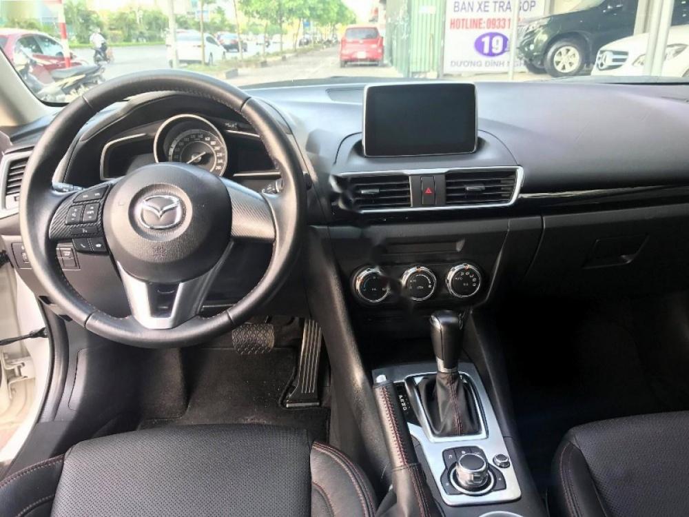 Mazda 3 1.5AT 2015 - Bán xe Mazda 3 1.5AT 2015, màu trắng số tự động, giá 620tr