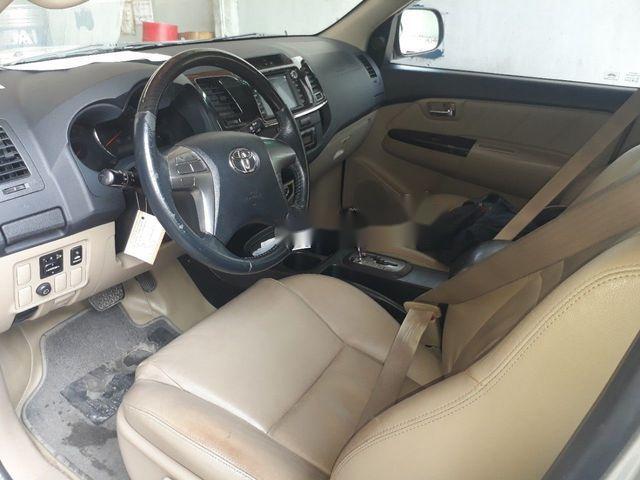 Toyota Fortuner 2014 - Cần bán lại xe Toyota Fortuner đời 2014, màu bạc