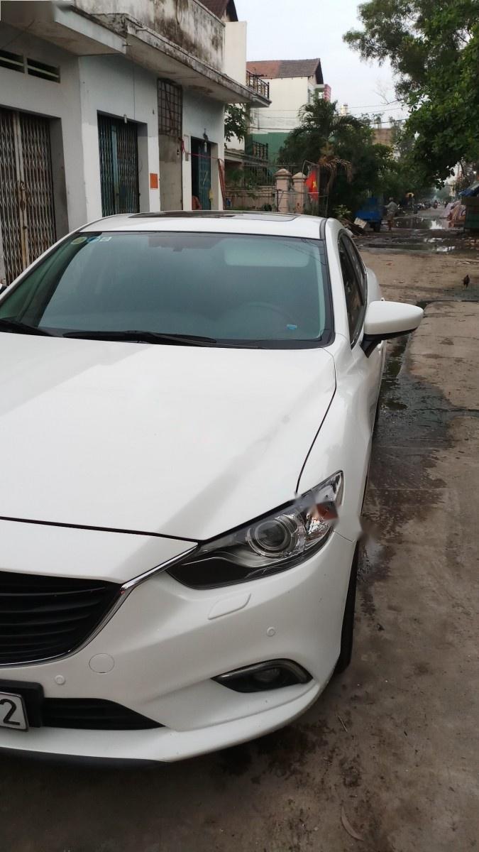 Mazda 6 At 2015 - Cần bán gấp Mazda 6 At sản xuất năm 2015, màu trắng, giá chỉ 735 triệu