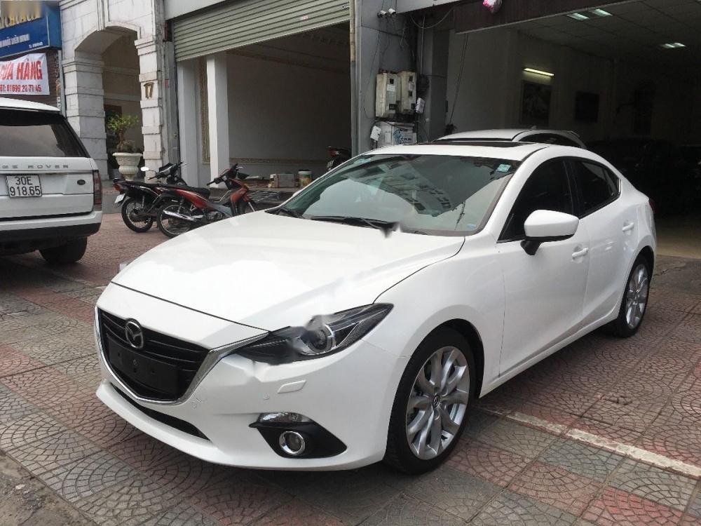 Mazda 3 2.0 AT 2016 - Cần bán Mazda 3 2.0 AT sản xuất năm 2016, màu trắng, giá 670tr