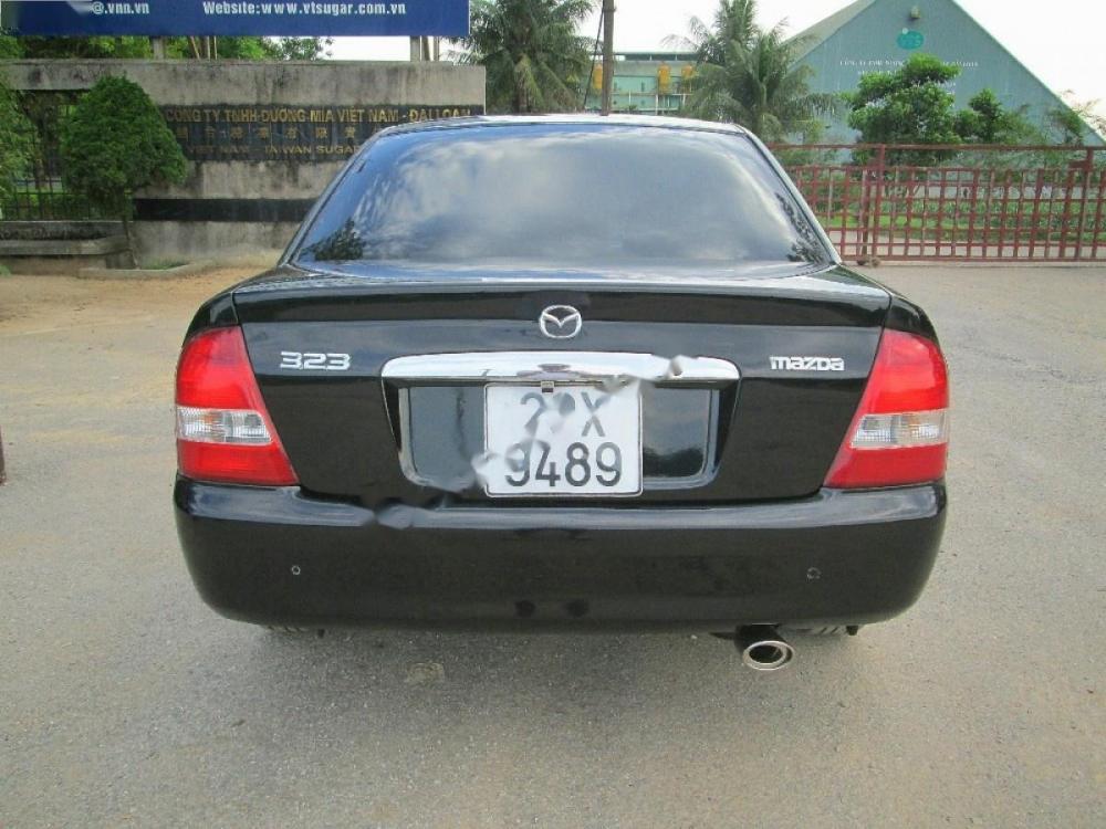 Mazda 323 GLX 2003 - Chính chủ bán Mazda 323 GLX năm 2003, màu đen