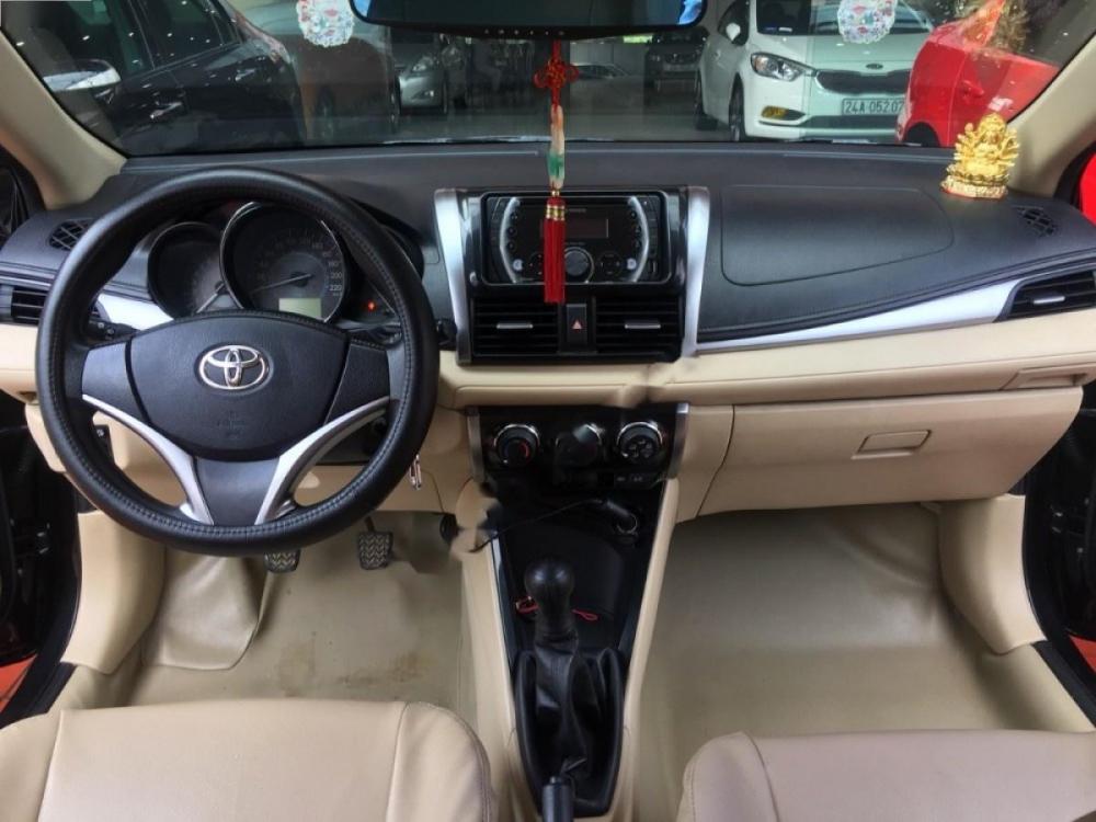 Toyota Vios 1.5E 2015 - Bán ô tô Toyota Vios 1.5E sản xuất 2015, màu đen số sàn