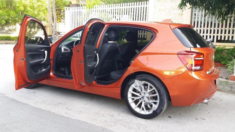 BMW 1 Series 116i  2013 - Bán BMW 1 Series 116i đời 2013, xe nhập, màu cam