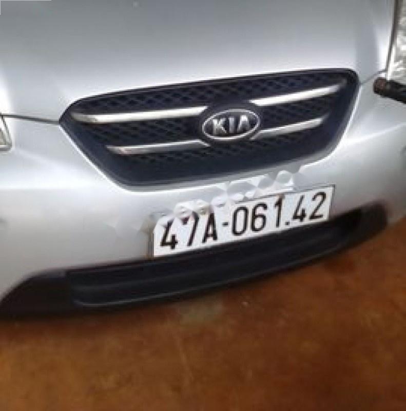 Kia Carens LX 1.6 MT 2010 - Bán xe Kia Carens LX 1.6 MT đời 2010, màu bạc  