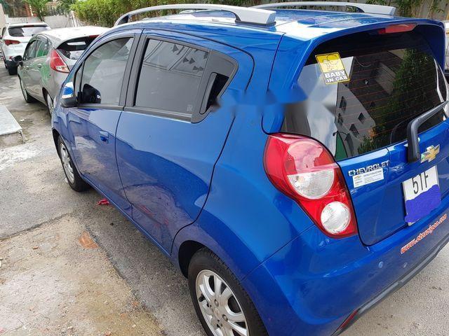 Chevrolet Spark   LTZ  2015 - Bán ô tô Chevrolet Spark LTZ năm 2015 còn mới, màu xanh, giá 295tr