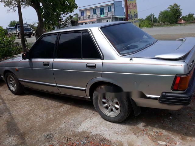 Nissan Bluebird 2005 - Cần bán xe Nissan Bluebird đời 2005, màu bạc