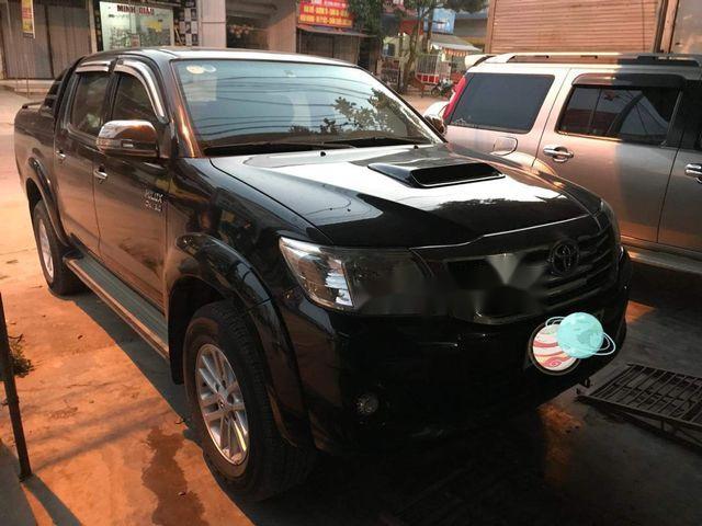 Toyota Hilux 2014 - Bán ô tô Toyota Hilux sản xuất năm 2014, màu đen, giá 534.9tr