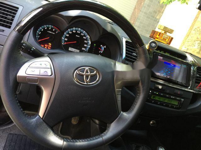 Toyota Fortuner 4x4 AT 2015 - Cần bán lại xe Toyota Fortuner 4x4 AT đời 2015, màu xám chính chủ giá cạnh tranh