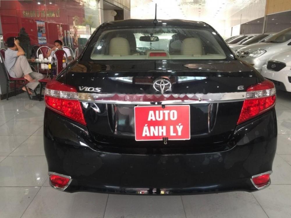 Toyota Vios 1.5E 2015 - Bán ô tô Toyota Vios 1.5E sản xuất 2015, màu đen số sàn