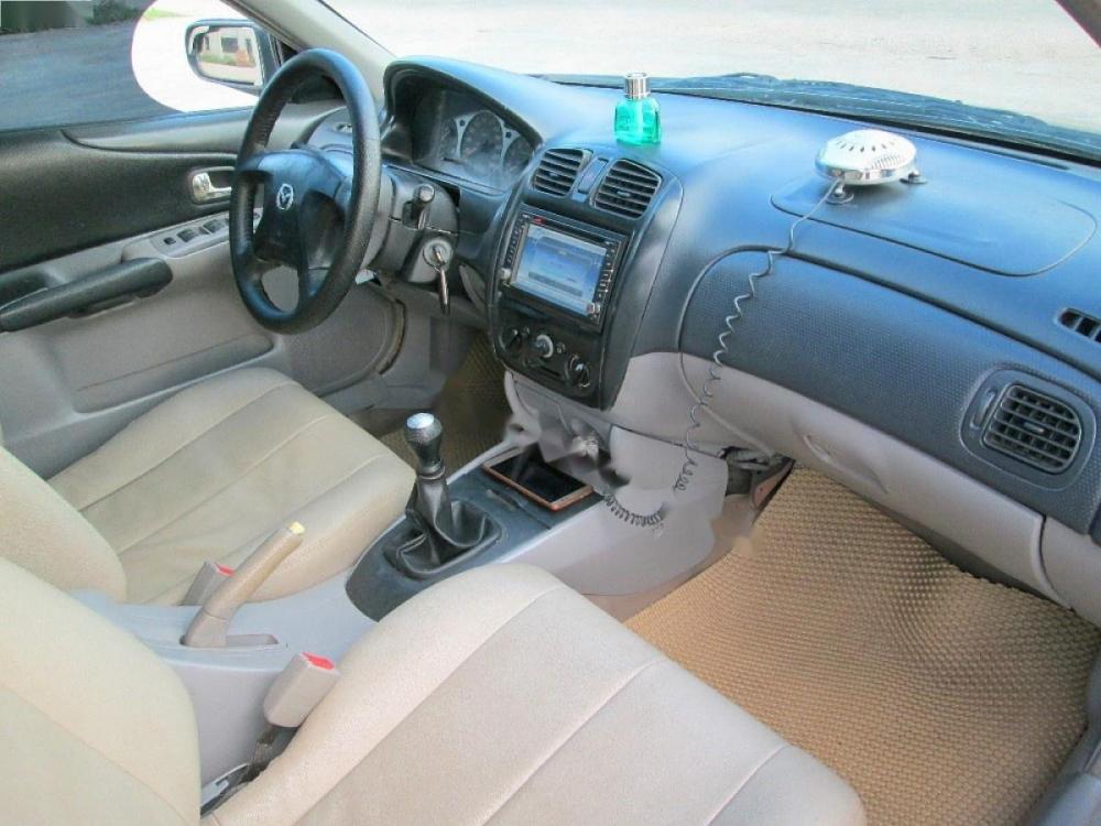 Mazda 323 GLX 2003 - Chính chủ bán Mazda 323 GLX năm 2003, màu đen