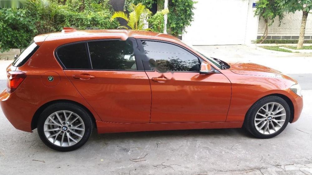 BMW 1 Series 116i  2013 - Bán BMW 1 Series 116i đời 2013, xe nhập, màu cam