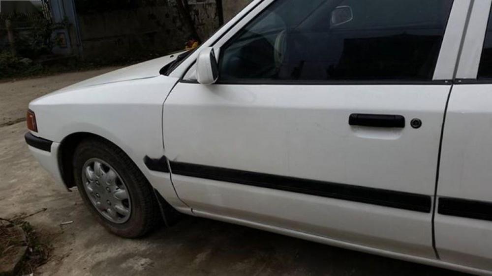 Mazda 323 1997 - Bán Mazda 323 sản xuất năm 1997, màu trắng, nhập khẩu