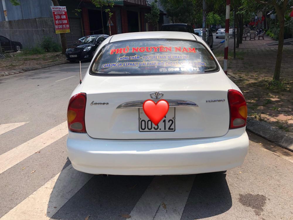 Daewoo Lanos 2003 - Cần bán xe Daewoo Lanos sản xuất 2003 màu trắng, giá tốt