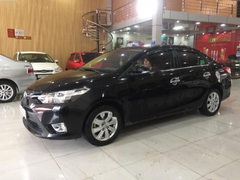 Toyota Vios 1.5E 2015 - Bán ô tô Toyota Vios 1.5E sản xuất 2015, màu đen số sàn
