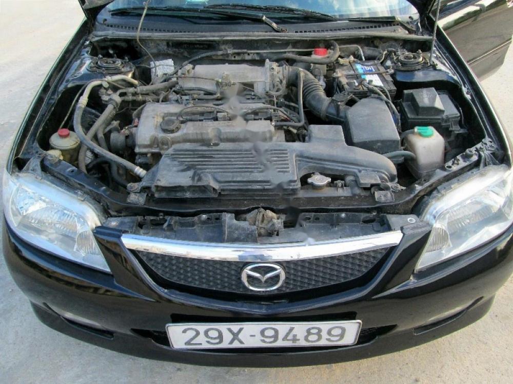 Mazda 323 GLX 2003 - Chính chủ bán Mazda 323 GLX năm 2003, màu đen