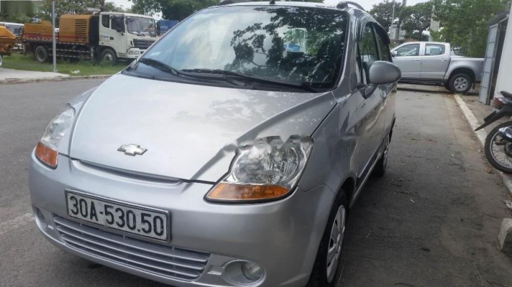 Chevrolet Spark MT   2009 - Gia đình bán lại xe Chevrolet Spark MT 2009, màu bạc 