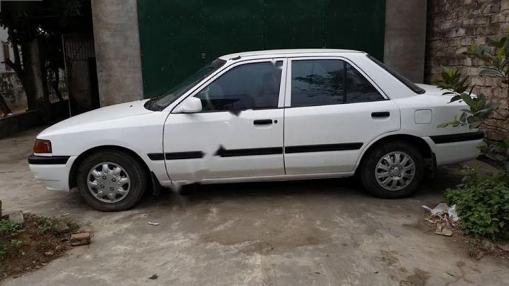 Mazda 323 1997 - Bán Mazda 323 sản xuất năm 1997, màu trắng, nhập khẩu