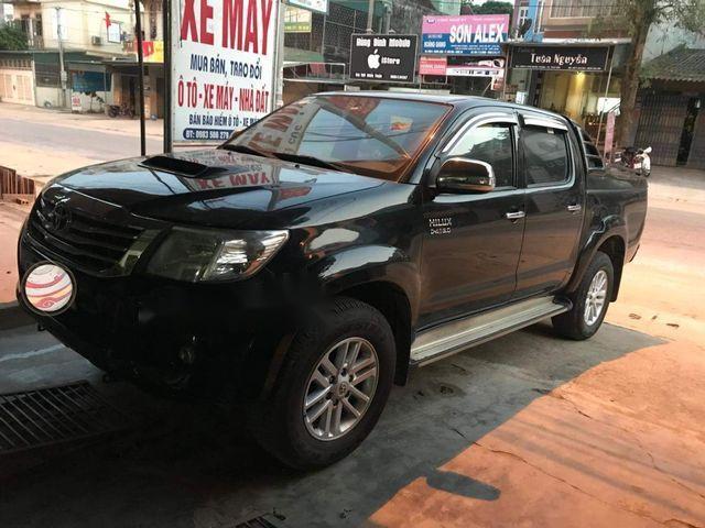 Toyota Hilux 2014 - Bán ô tô Toyota Hilux sản xuất năm 2014, màu đen, giá 534.9tr