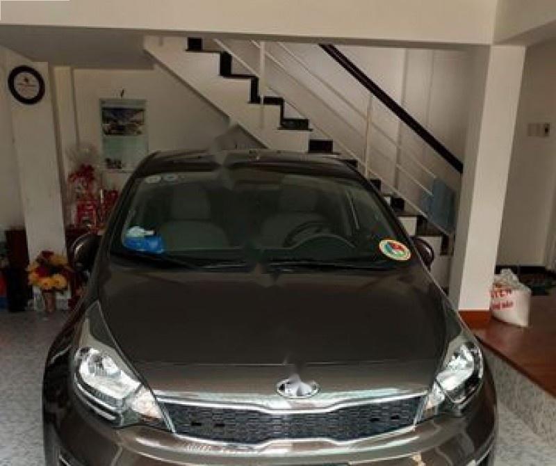 Kia Rio 1.4 AT 2015 - Cần bán gấp Kia Rio 1.4 AT sản xuất năm 2015, màu nâu, nhập khẩu