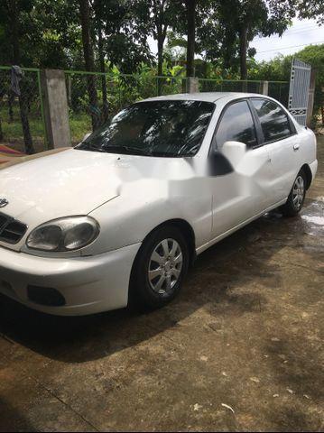 Daewoo Lanos 2002 - Cần bán xe Daewoo Lanos sản xuất 2002, màu trắng