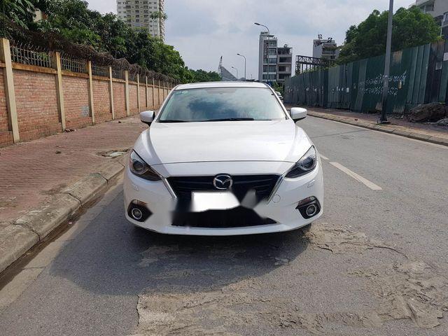 Mazda 3 2.0 2015 - Cần bán Mazda 3 2.0 sản xuất 2015, màu trắng, 660tr