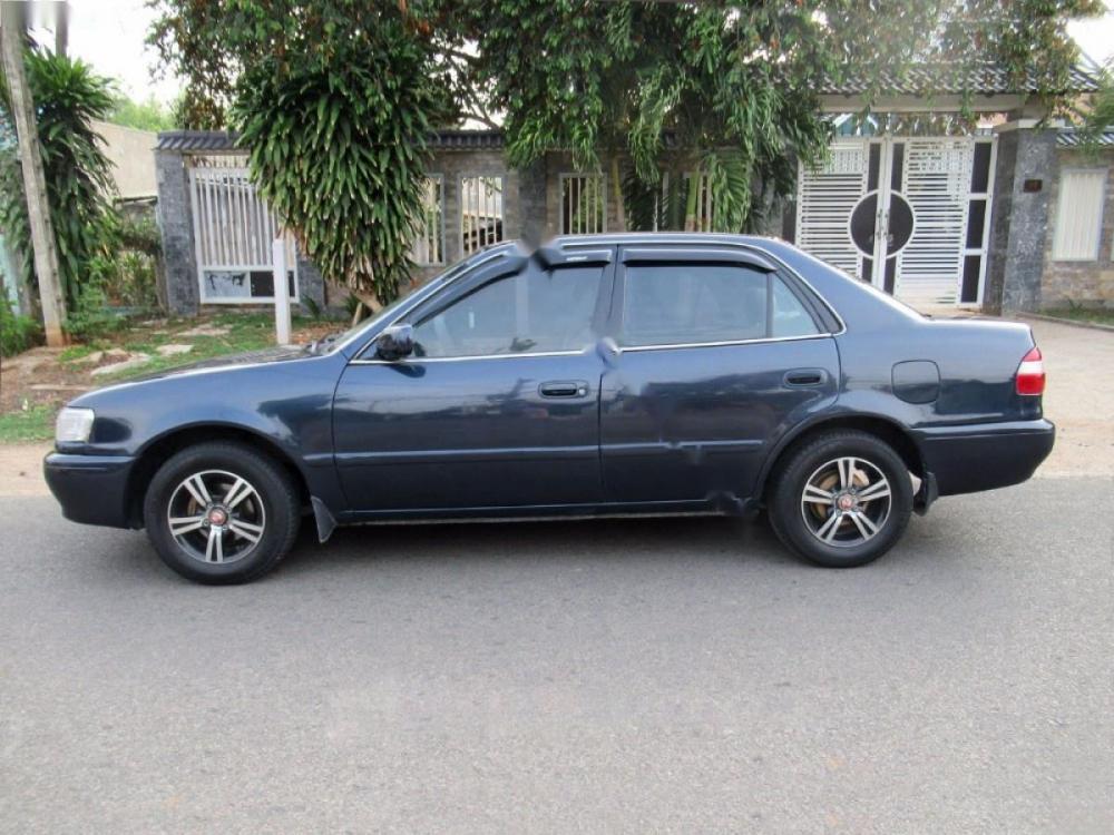 Toyota Corolla GLi 1.6 MT 1997 - Bán Toyota Corolla GLI 1.6 sản xuất năm 1997, màu xanh lam giá cạnh tranh