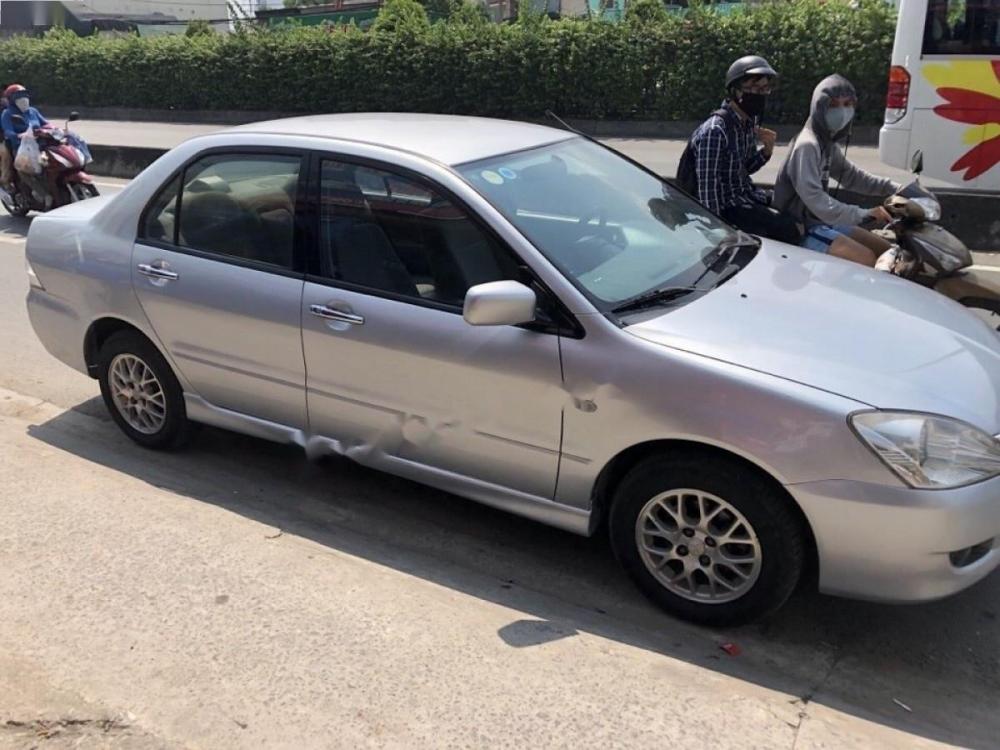 Mitsubishi Lancer 2005 - Cần bán xe Mitsubishi Lancer đời 2005, màu bạc giá cạnh tranh