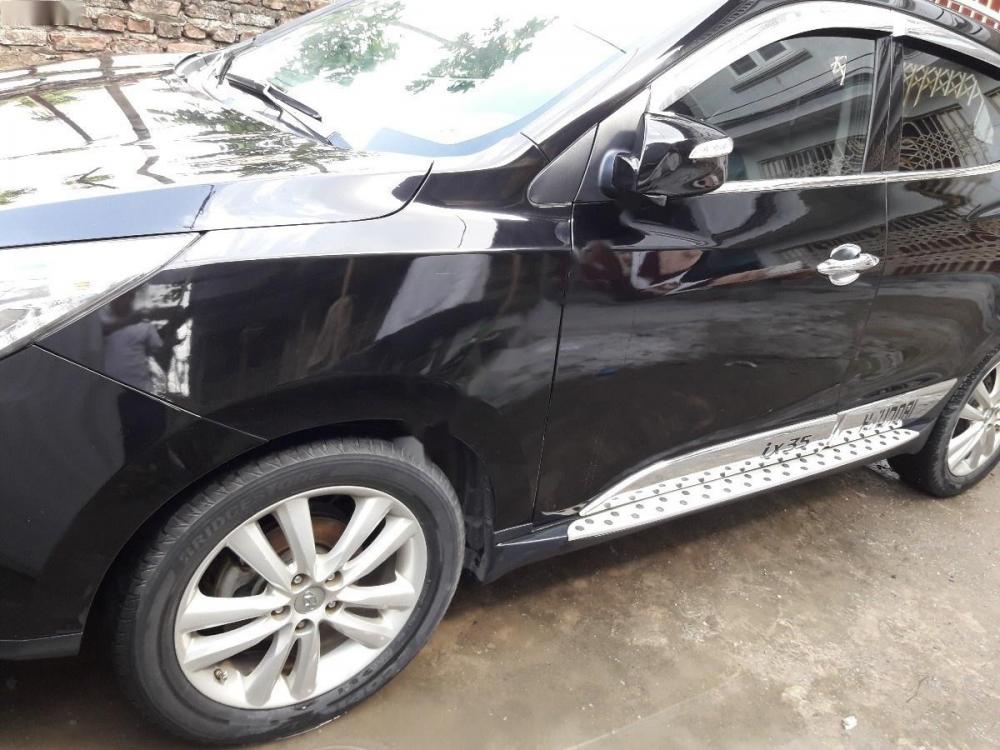 Hyundai Tucson LMX 2.0 eVGT 2010 - Bán ô tô Hyundai Tucson LMX 2.0 eVGT 2010, màu đen, xe nhập số tự động