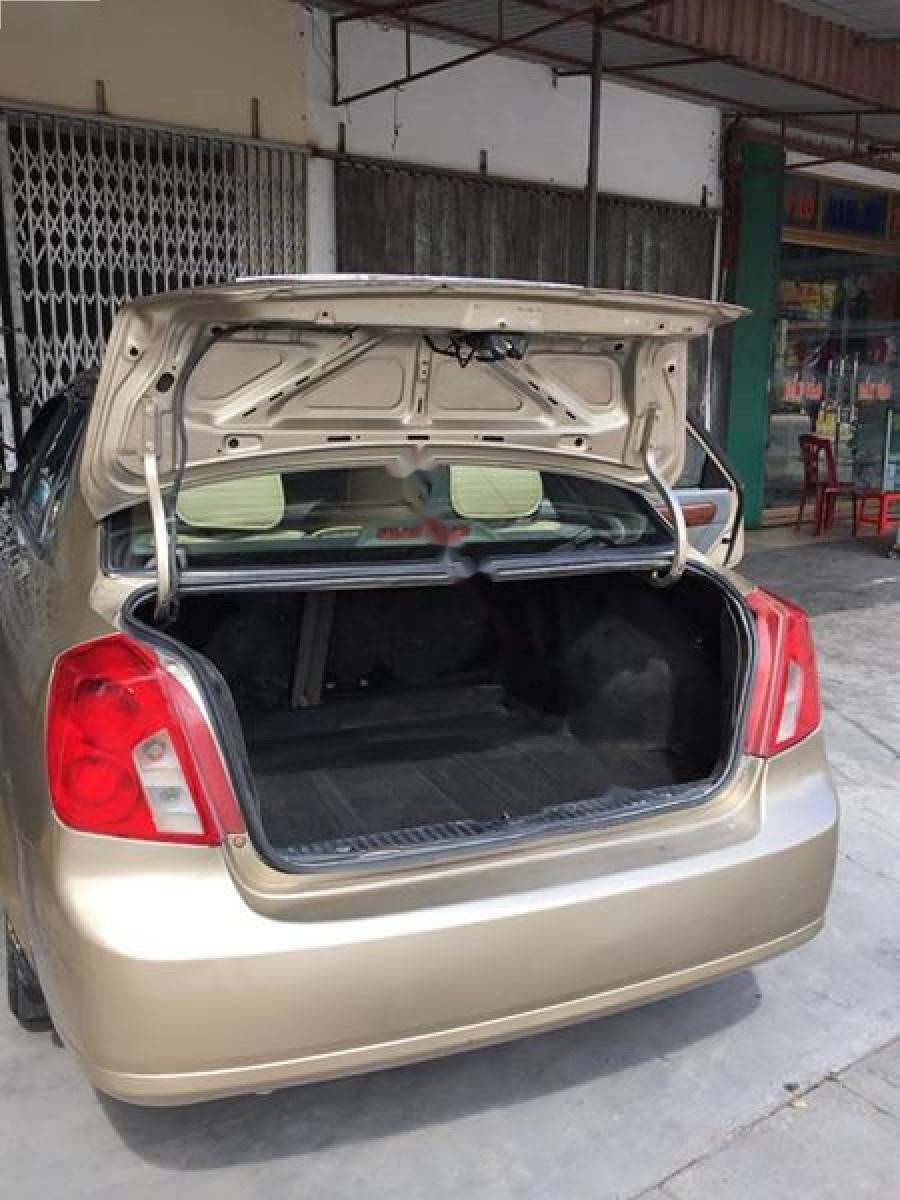 Daewoo Lacetti Max 1.8 MT 2005 - Bán ô tô Daewoo Lacetti Max 1.8 MT 2005, màu vàng